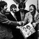 The Beatles hold the sleeve of Sgt. Pepper's Lonely Hearts Club Band, at the press launch for the album, held at Brian Epstein's house in London, May 19, 1967. (Photo: John Downing/Getty Images)